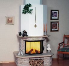 Печь камин в интерьере деревянного дома фото